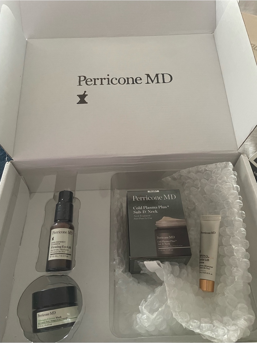 Perricone MD Skincare Set in White and Gold Accents